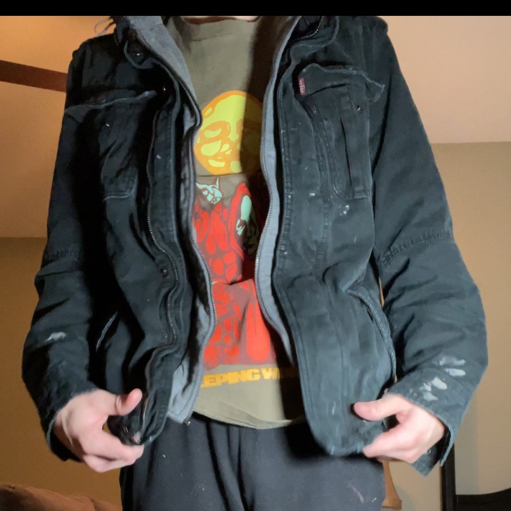 Levi’s men’s small jacket. Super warm. Cinches on hood.